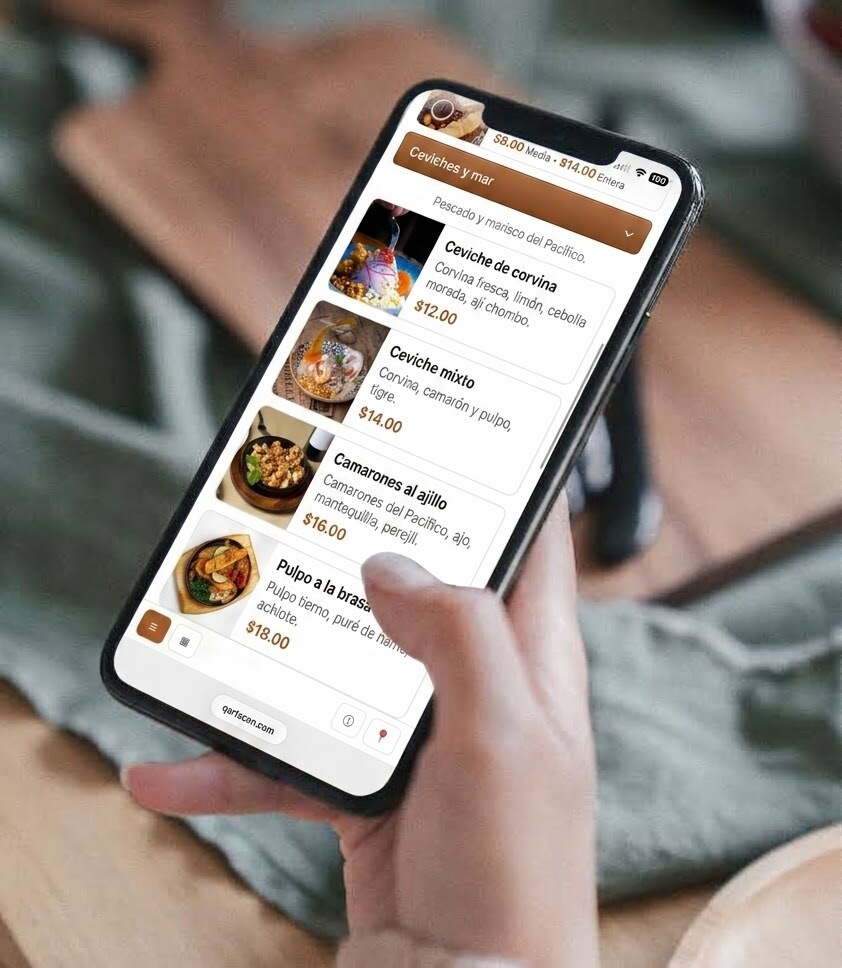 A guest checking the digital menu on their phone